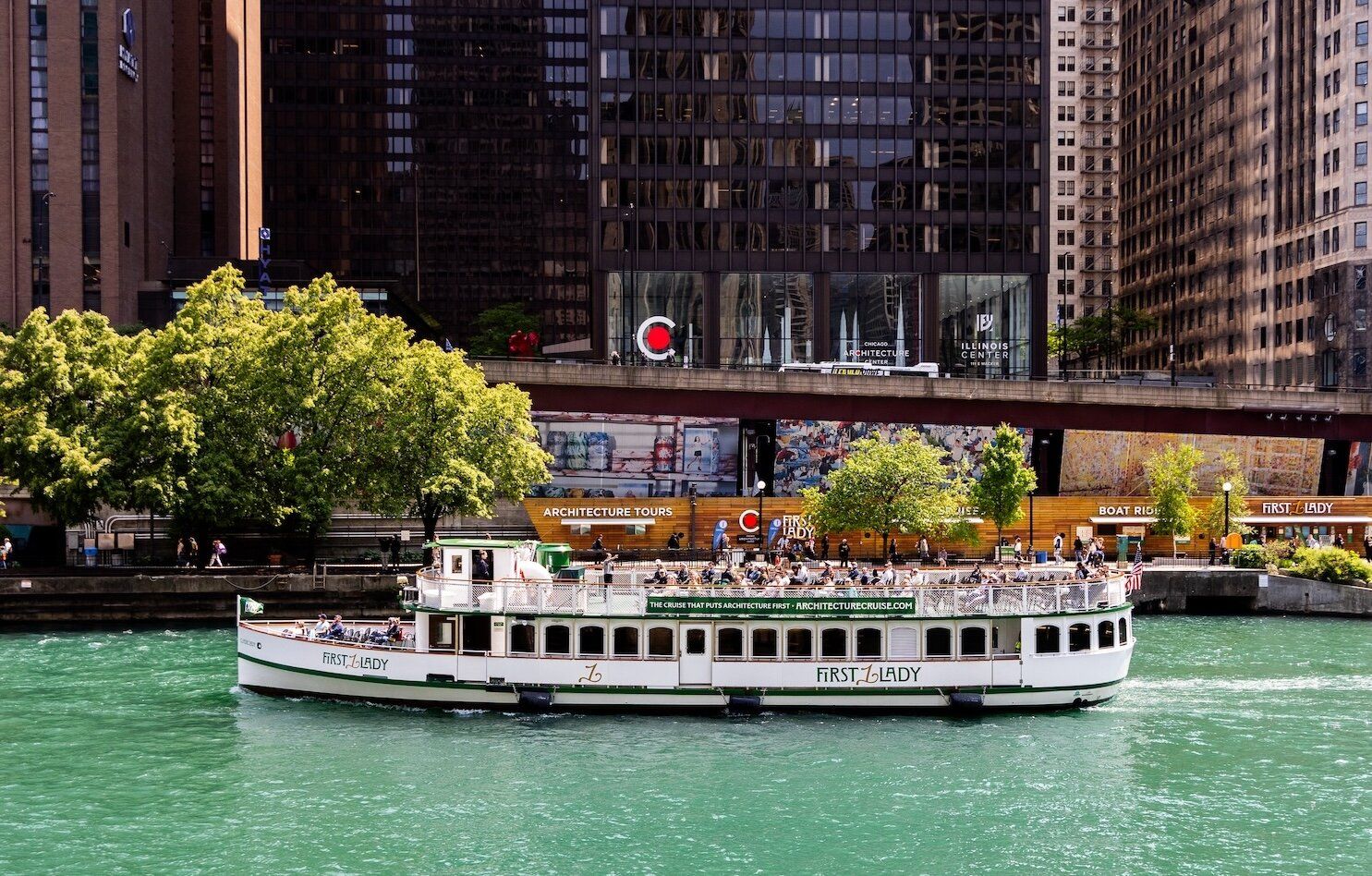 a river boat on a blue river.
