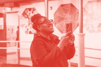 Image of woman taking photo