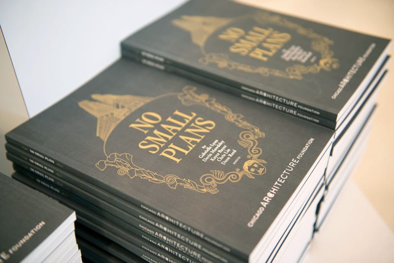 A stack of No Small Plans books