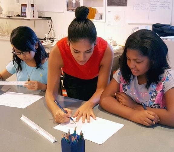 image of teacher teaching students