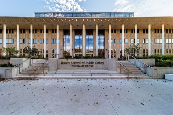 exterior of academic building with several columns 