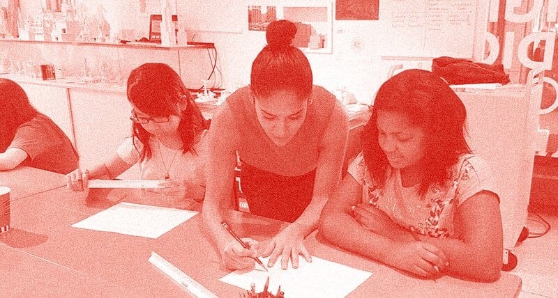 Image of educator teaching a person