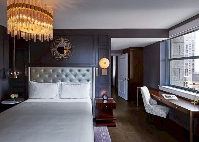 Interior of an elegant gold black themed hotel room