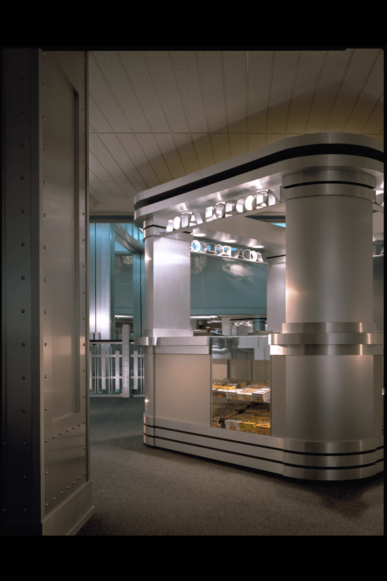 interior of a building with silver furniture.