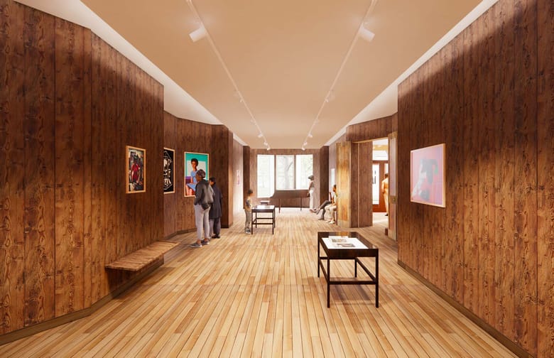 Interior of an exhibitions gallery with people looking at exhibits