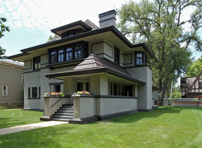 Hills-DeCaro House by Frank Lloyd Wright, showcasing Prairie School architecture with horizontal lines, a low-pitched roof, and distinctive geometric window patterns.