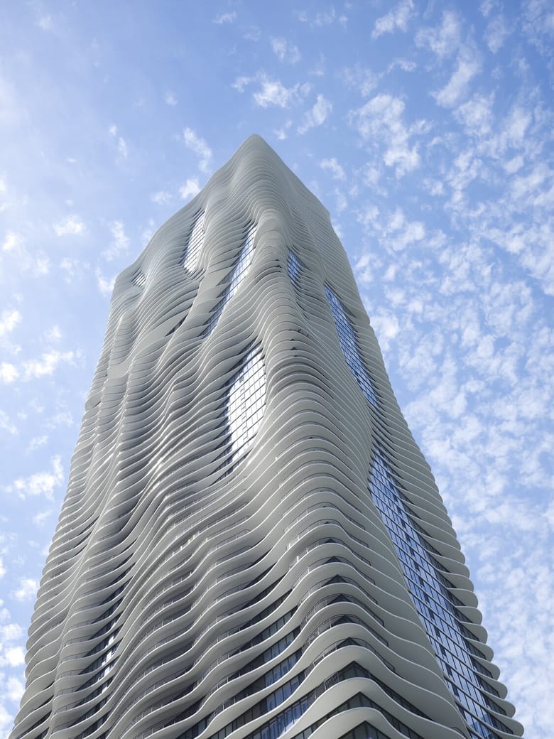 Large wavy skyscraper. 