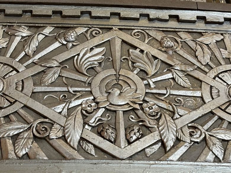 Close up detail inside a building in gold, nature inspired