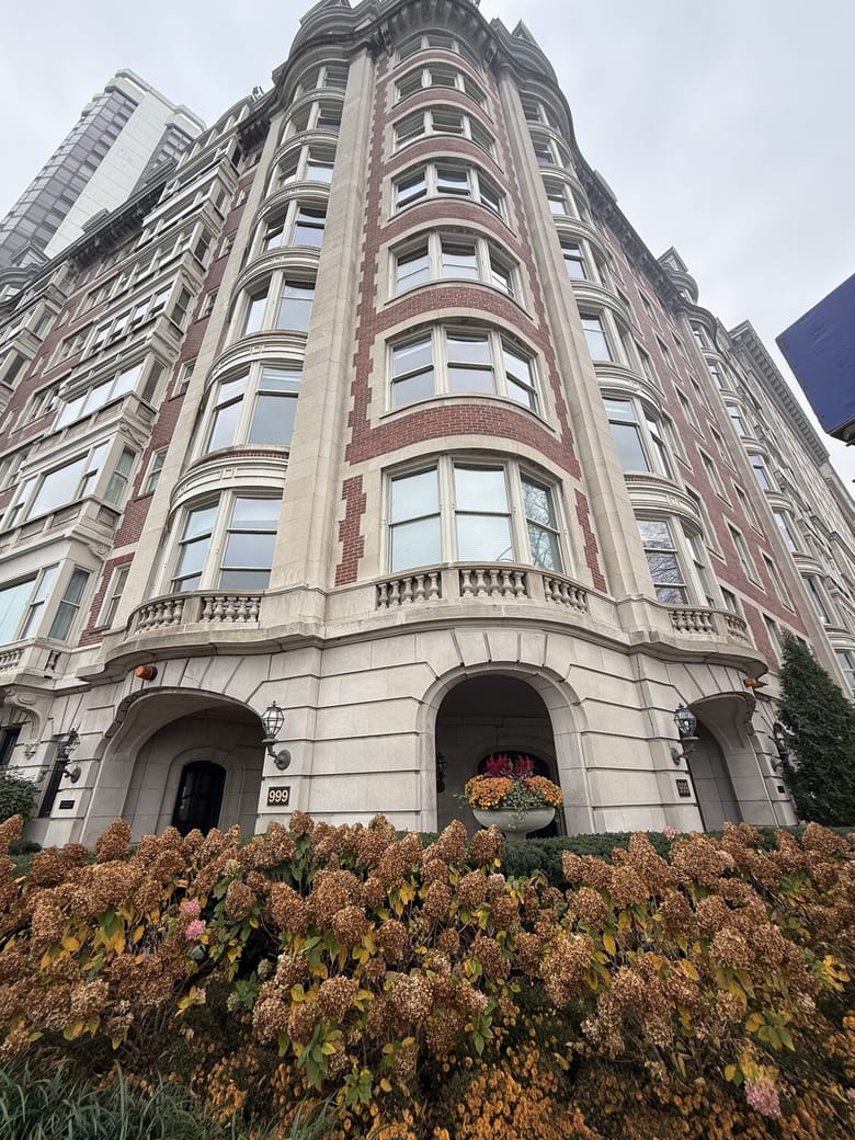 Image of a tall white building.