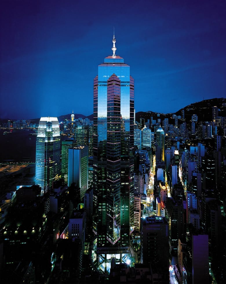 image of a dark skyline with lit up buildings