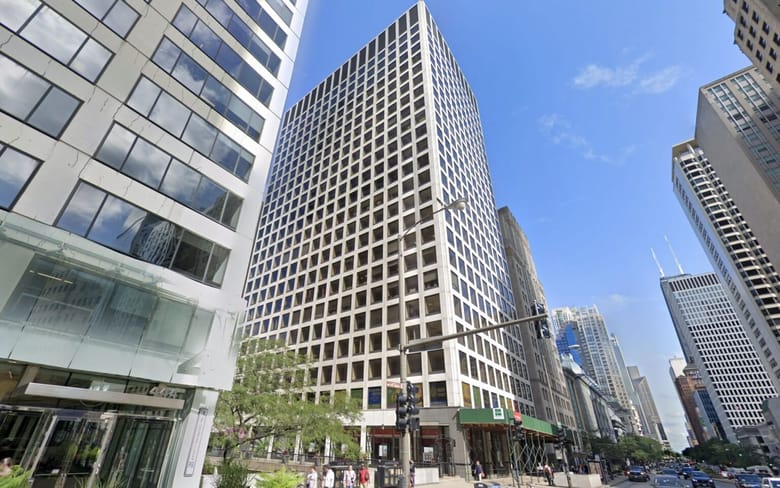 exterior of tall white and black building