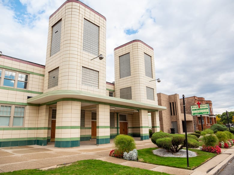 Image of a building exterior with two towers.