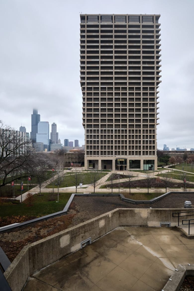 Tall building with Chicago skyline in the background