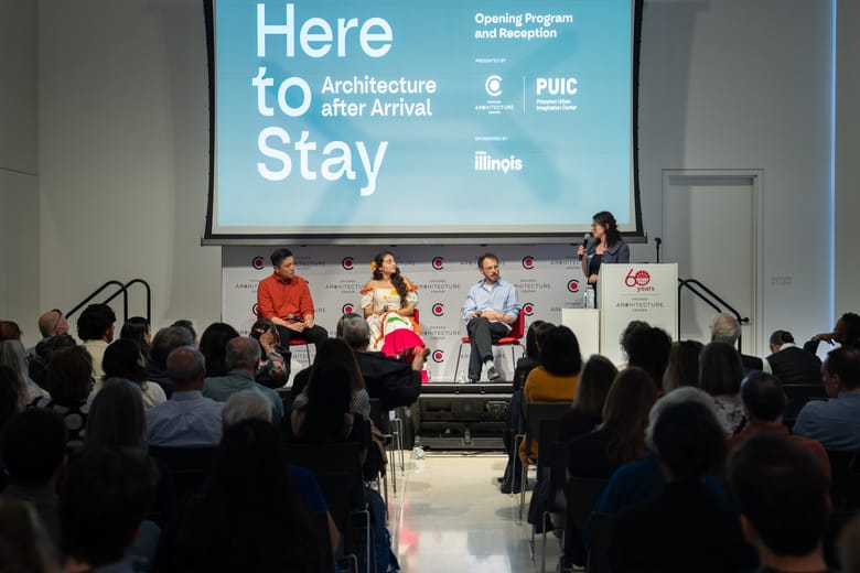 People on a panel talking.