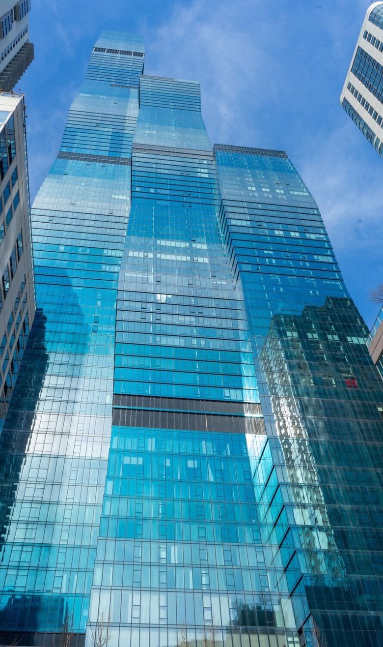 A closeup photo of St. Regis Chicago skyscraper