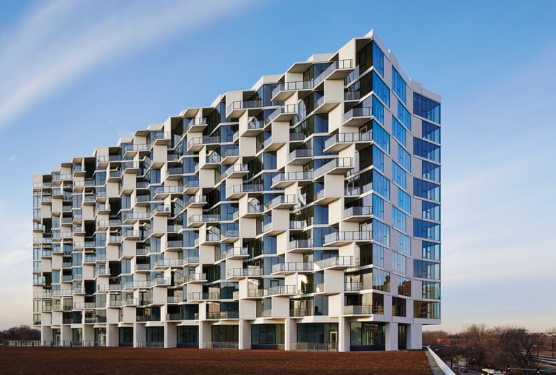 A mid-rise building with jagged angles and edges