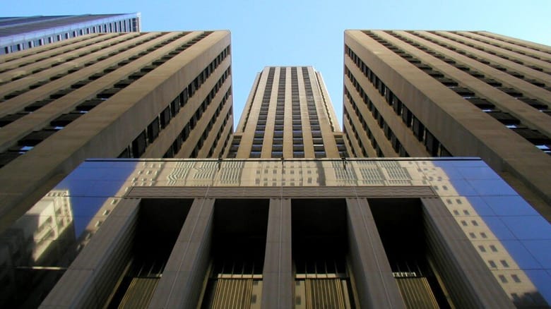 Exterior of a stately gold building
