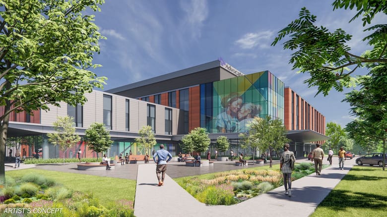 Rendering of a multistory building with a colorful facade surrounded by greenery.