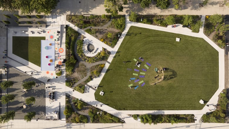 Aerial view of a lanscape and garden with different walkways.