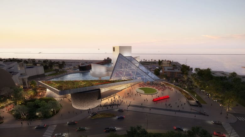 Image of a modern building with a glass pyramid.