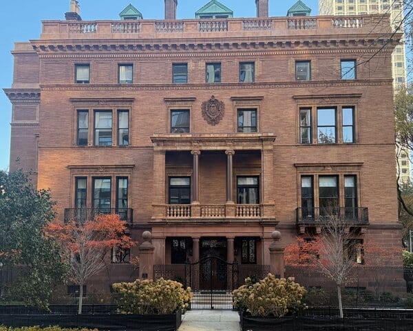Large brick building with six stories.
