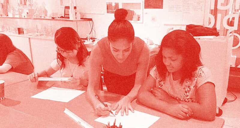 Image of educator teaching a person